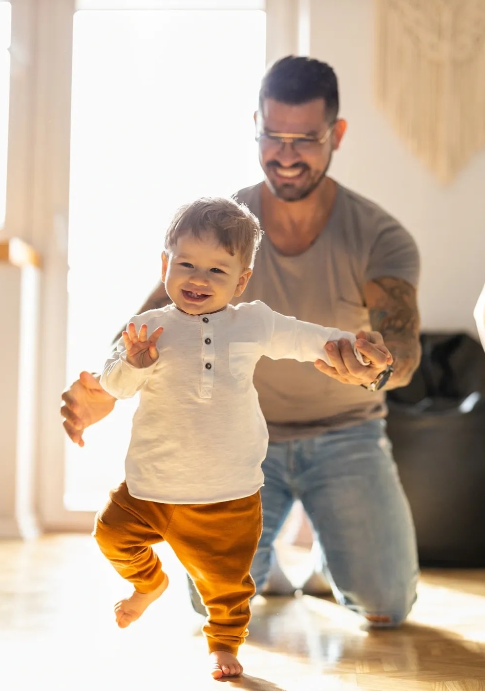 A father and child walking together — connection, strength, and moving forward